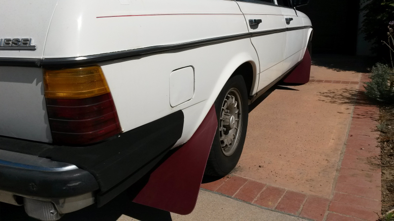 Maroon mudflaps were soon added to match the car’s pinstripes.